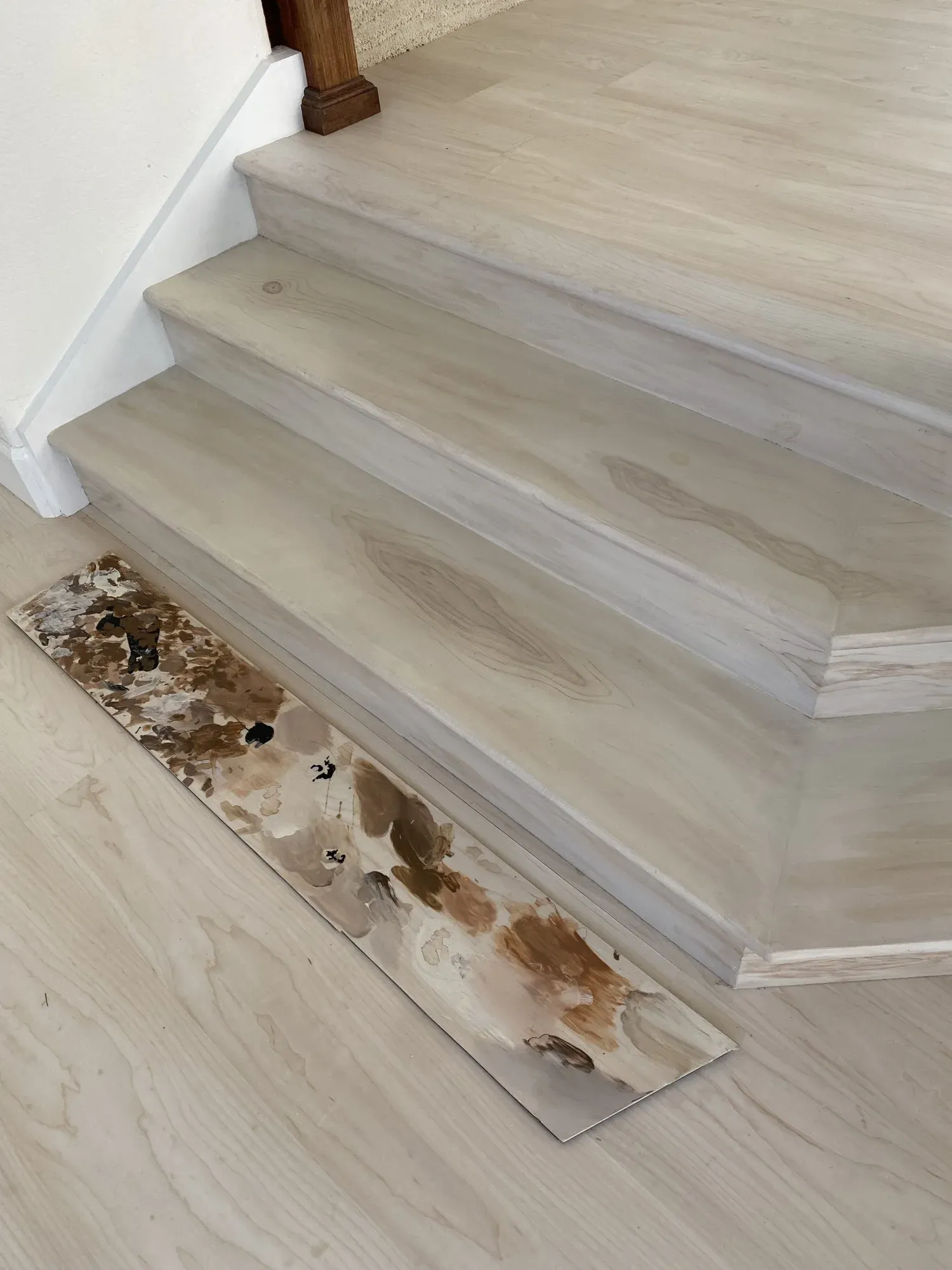 Close view of a hand-painted floral staircase runner